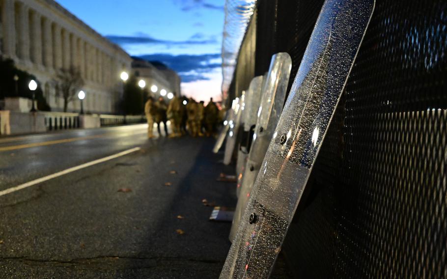 Riot shields belonging to National Guard members lean against a fence near the U.S. Capitol Building Jan 20, 2021 in Washington, D.C.