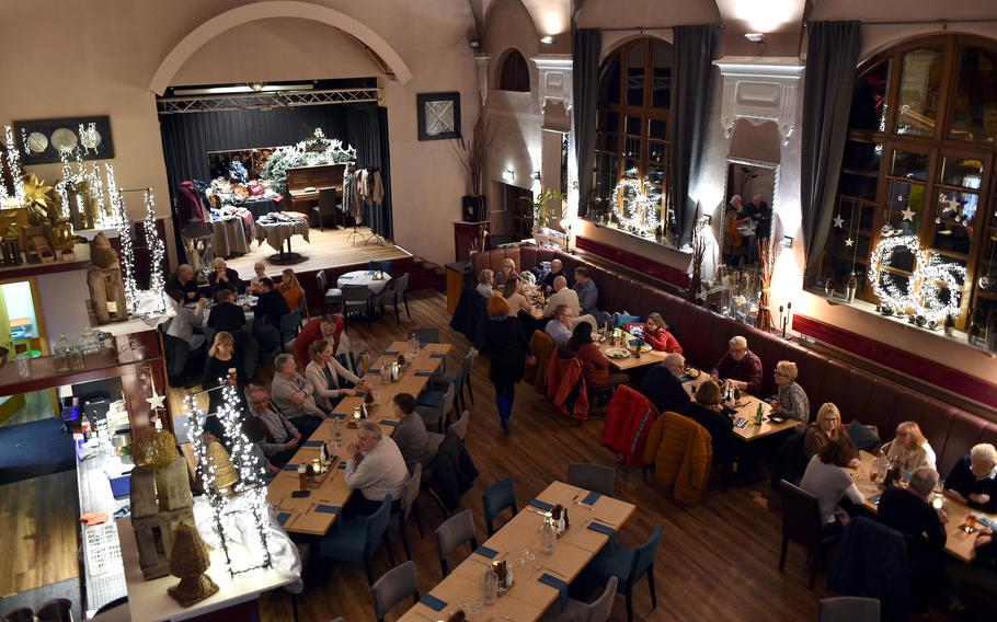 The first floor of Restaurant MAX in Winnweiler, Germany, is decked out for the holidays on Dec. 17, 2022. The restaurant opened in 1990 in a former gym and lies next to the Jewish Museum of the North Pfalz.