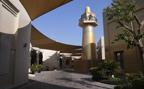 The Golden Mosque at the Katara Cultural Village in Doha, Qatar, is built in the style of the Ottoman Empire but covered in tiny golden chips.