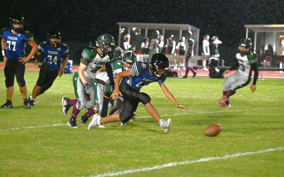 Hohenfels receiver Hector Prano recovers his fumble after a short catch and run in the first half of a football game against the AFNORTH Lions on Sept. 29, 2023 at Hohenfels Middle High School.