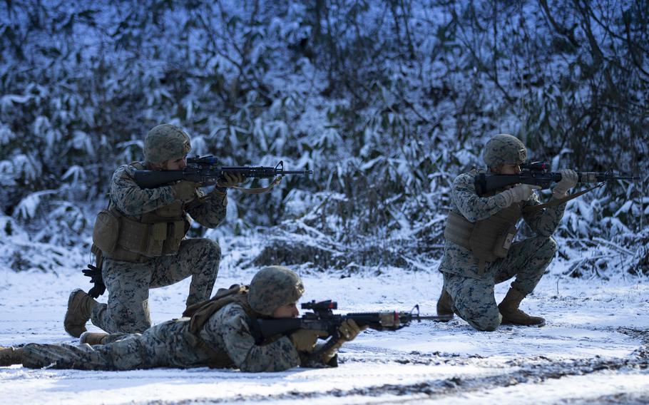 Members of Combat Logistics Battalion 4, 3rd Marine Logistics Group take part in tactical logistics training during the Resolute Dragon exercise in Iwate, Japan, Dec. 5, 2021. 