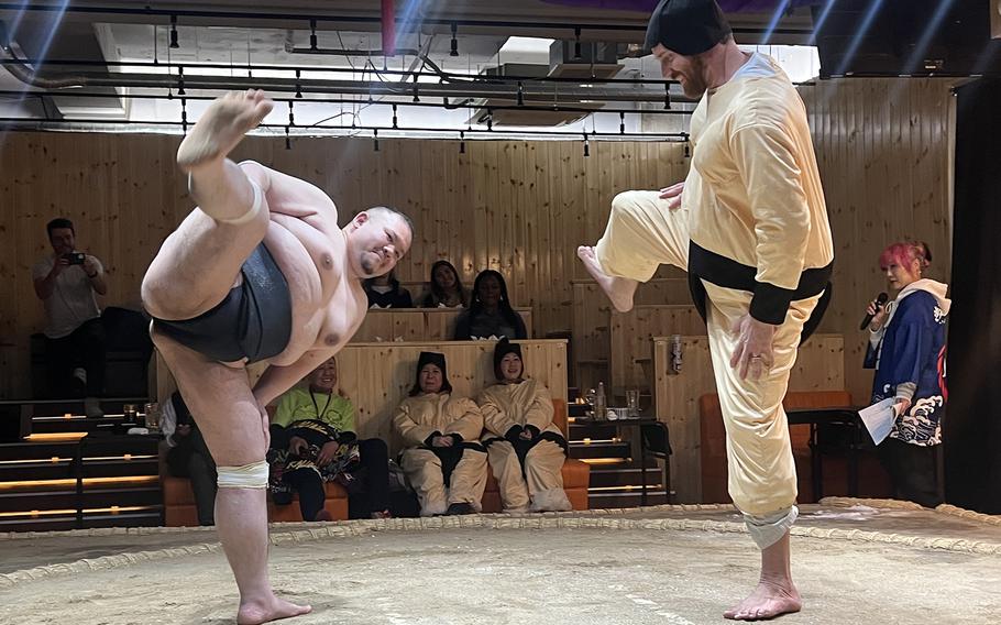 Audience volunteers — wearing inflatable sumo suits — may combat the wrestler of their choice at Asakusa Sumo Club in Tokyo.