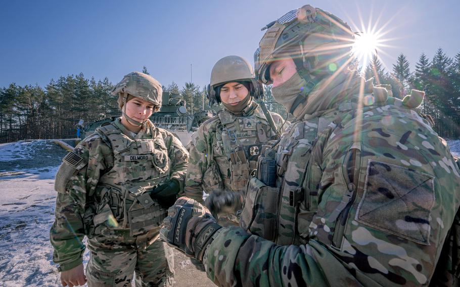 Second Lt. Marina Delmoro, left, Sgt. Lamar Begay and Staff Sgt. Robert O’Donnell train on the maneuver short-range air defense system at Grafenwoehr Training Area, Germany, Feb. 9, 2023.