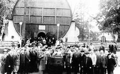 An archive photo shows builders and locals after the finishing of the Restaurant Dürkheimer Fass, in Bad Dürkheim, Germany, in 1934. Placed next to fairgrounds, the giant wine barrel restaurant has been a tourist site since it opened its doors. 