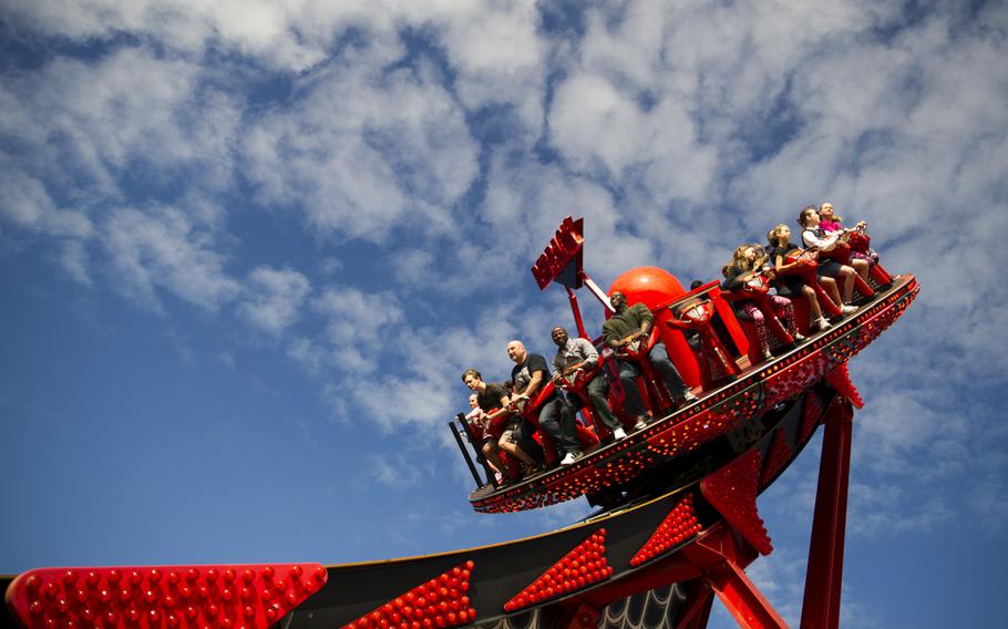 Fairgoers enjoy a thrill ride.