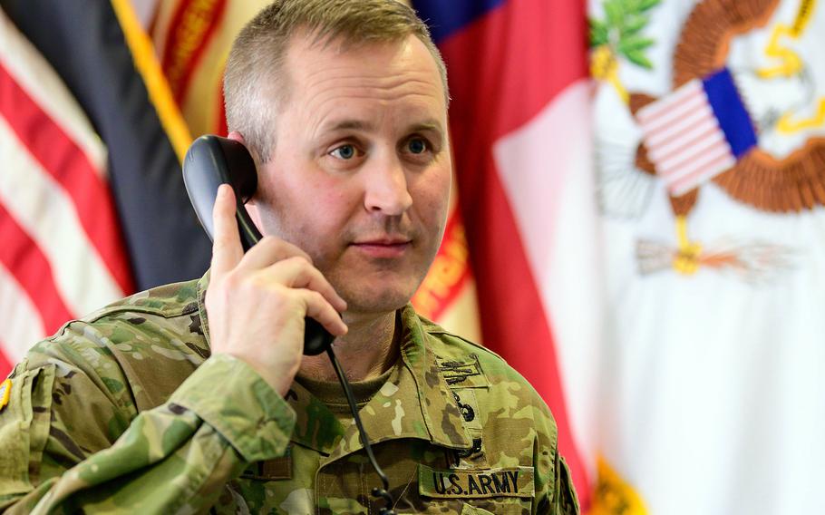 The outgoing U.S. Army Garrison Stuttgart commander, Col. Jason Condrey, talks on the phone in his office on Panzer Kaserne earlier this year. Condrey is moving to his next assignment and turning over the garrison to Col. Matthew Ziglar in a ceremony at Patch Barracks on May 19, 2021.

Paul Hughes/USAG Stuttgart