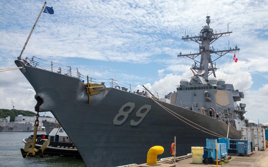 The guided-missile destroyer USS Mustin prepares to depart Yokosuka Naval Base, Japan, June 22, 2021. 