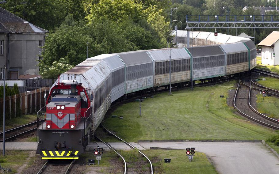 Cargo trains from the Russian enclave of Kaliningrad move to the border railway station in Kybartai, some 124 miles west of the capital Vilnius, Lithuania, on Wednesday, June. 22, 2022.