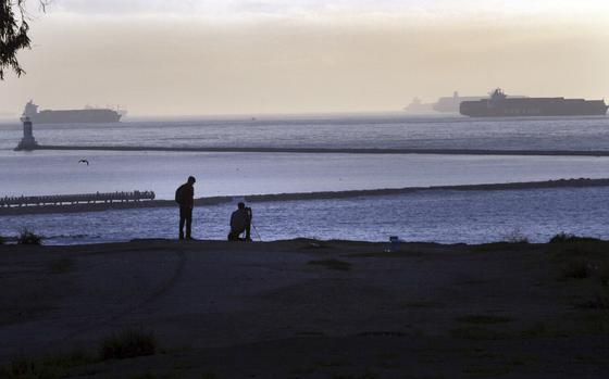 SAN PEDRO, CA - OCTOBER 26, 2014: Five container ships just outside the Angels Gate entrance to the port of Los Angeles seen from the cliffs at Point Fermin park in San Pedro on OCTOBER 26, 2014. ( Bob Chamberlin / Los Angeles Times )