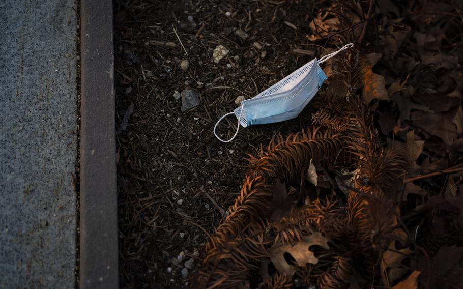 A discarded face mask near the Capitol. The Centers for Disease Control and Prevention has eased mask recommendations for the vast majority of the country.