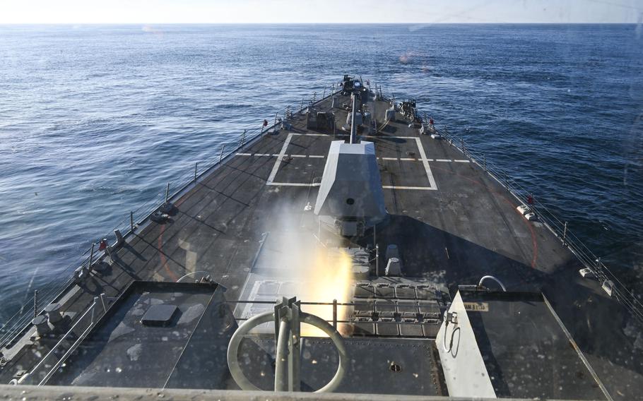 A missile fires from a Navy destroyer.