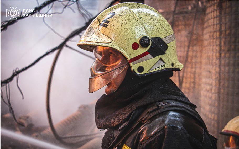 Ukrainian emergency staff work at the site of a Russian air attack in Kharkiv, Ukraine, on March 22, 2024.