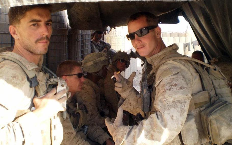 Marine Sgt. Michael Spivey, left, was wounded in a bomb blast in Helmand province, Afghanistan, in December, 2010. 