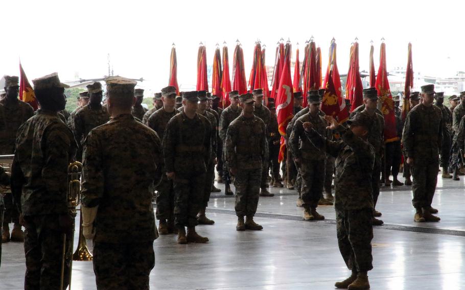 The III Marine Expeditionary Force Band performs during IIMEF's change-of-command ceremony at Marine Corps Air Station Futenma, Okinawa, Friday, Jan. 26, 2024.