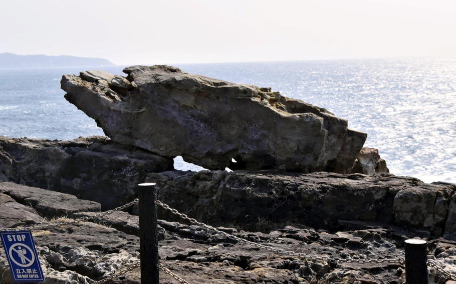 A boulder named Sudden Rock is seen at the Sandanbeki cliffs in Shirahama, Wakayama Prefecture, Japan.