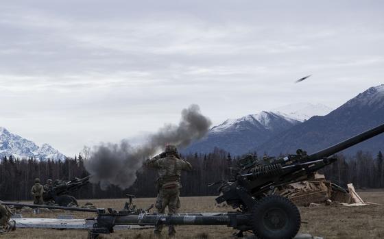 U.S. Army paratroopers with 2nd Battalion, 377th Parachute Field Artillery Regiment, 11th Airborne Division, “Arctic Angels,” U.S. Army Alaska, fire a M119 105mm howitzer while conducting joint forcible entry operation at Malemute Drop Zone, Joint Base Elmendorf-Richardson, Alaska, during Arctic Aloha, Nov. 2, 2023. Arctic Aloha is a joint Army and Air Force exercise designed to prepare the 11th Airborne Division’s paratroopers for decisive action operations in the U.S. Army Pacific area of responsibility and validate the ability to establish an intermediate staging base in the Pacific and follow-on joint forcible entry in the Arctic environment. (U.S. Air Force photo by Senior Airman Julia Lebens)