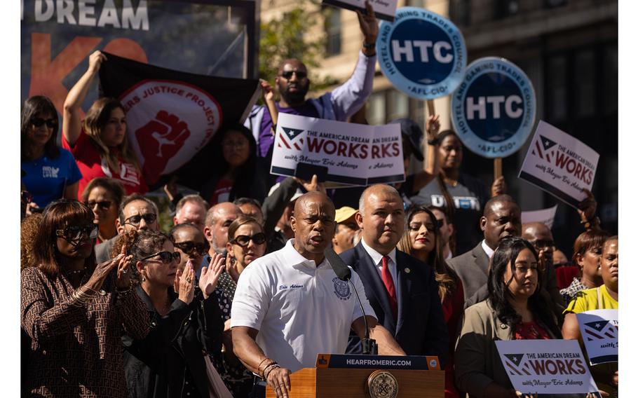 New York Mayor Eric Adams speaks at a rally calling for expedited federal work authorization for asylum seekers.