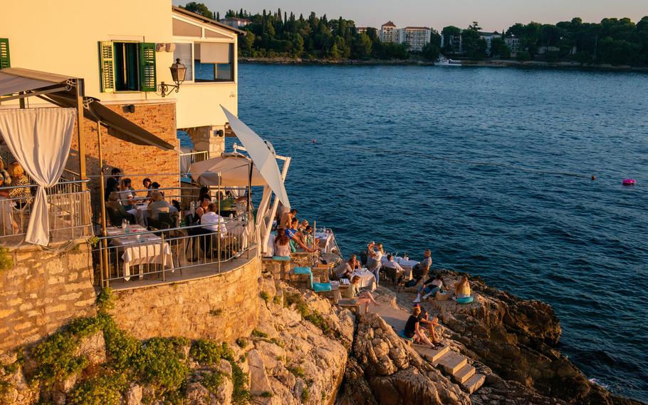 La Puntulina is a Michelin-rated restaurant in Rovinj, Croatia, famous for its terrace that covers the rocks along the waterfront. 