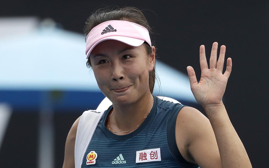 China’s Peng Shuai waves after losing to Canada’s Eugenie Bouchard in their first round match at the Australian Open tennis championships in Melbourne, Australia, on Jan. 15, 2019. Out of public view for almost three weeks, Chinese tennis player Peng Shuai appeared Sunday, Nov. 21, 2021, in a live video call with International Olympic Committee President Thomas Bach.