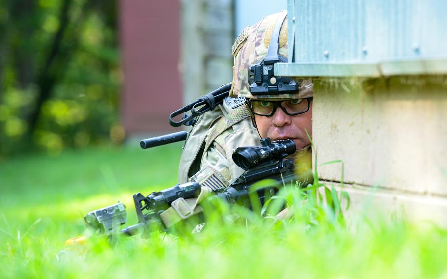A Security Force Assistance Brigade soldier — known as an advisor — reacts to an enemy attack during a pre-deployment training exercise Aug. 23, 2023 at Muscatatuck Training Center in Indiana. 