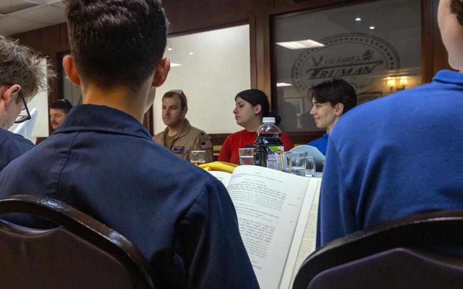 Sailors participate in a Seder
