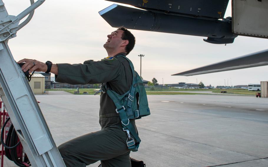 A pilot from the 34th Bomb Squadron boards a B1-B Lancer as part of exercise Combat Raider 21 at Ellsworth Air Force Base, S.D., July 20, 2021. Combat Raider is designed to train personnel on five real world mission objectives, such as counter-air, strategic strikes, strike coordination and reconnaissance, close air support and personnel recovery. 