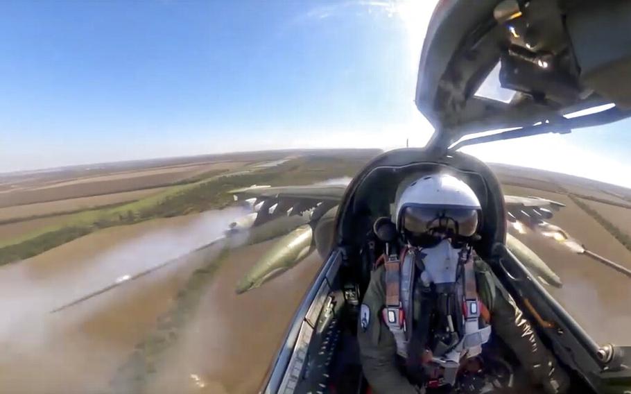 A Russian air force pilot is seen in the cockpit of his Su-25 as it flies on a mission in Ukraine, according to this Oct. 10, 2022, posting.