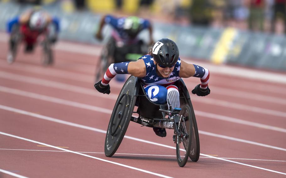 Kelly Elmlinger races a wheelchair during the 2017 Invictus Games in Toronto, Canada Sept. 24, 2017.