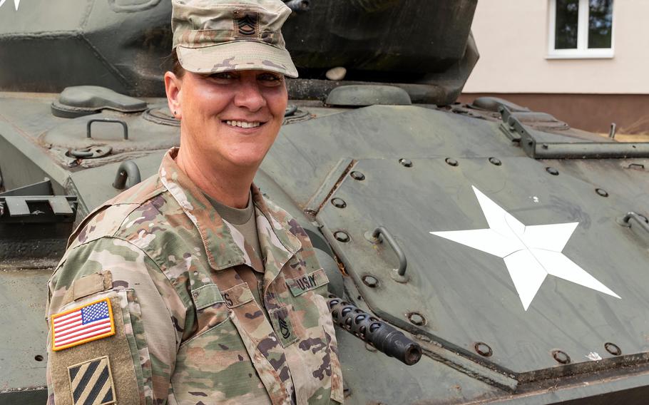 Army Sgt. 1st Class Michelle Paris at Sembach Kaserne, Germany, on May 26, 2022. A trained combat medic, Paris rushed to treat victims of a vehicle crash that she heard from her home. 