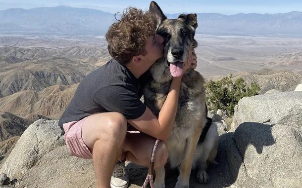 WeRateDogs founder Matt Nelson with his dog, Doug, in 2021. 