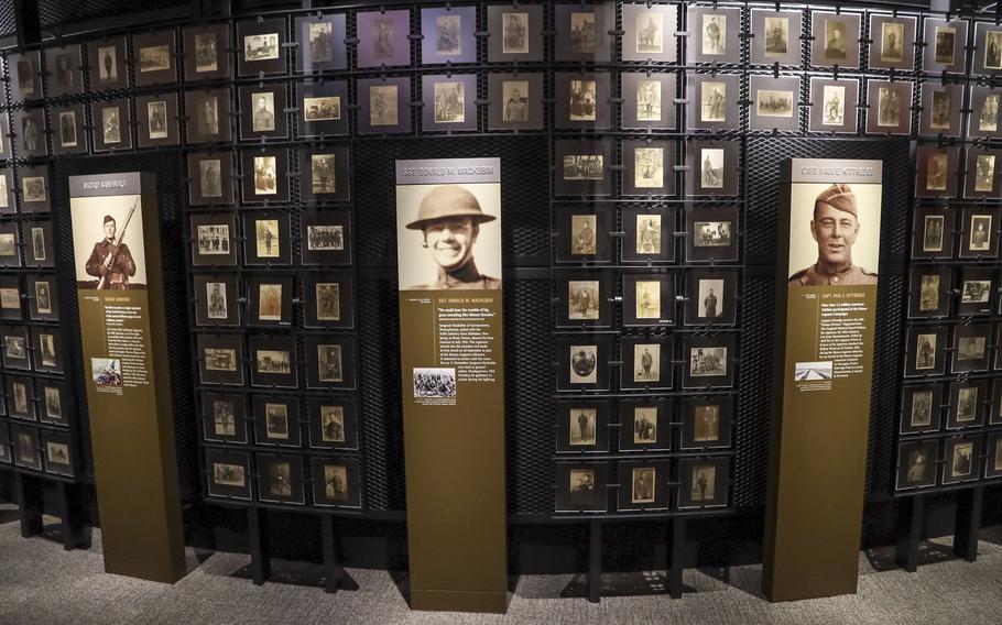 Photos of World War I doughboys fill a wall in the Nation Overseas Gallery at the National Museum of the United States Army on its reopening day, June 14, 2021.