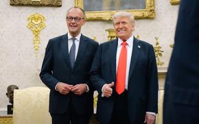 German Chancellor Friedrich Merz poses with U.S. President Donald Trump.