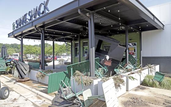 Debris litters a Shake Shake’s entrance.