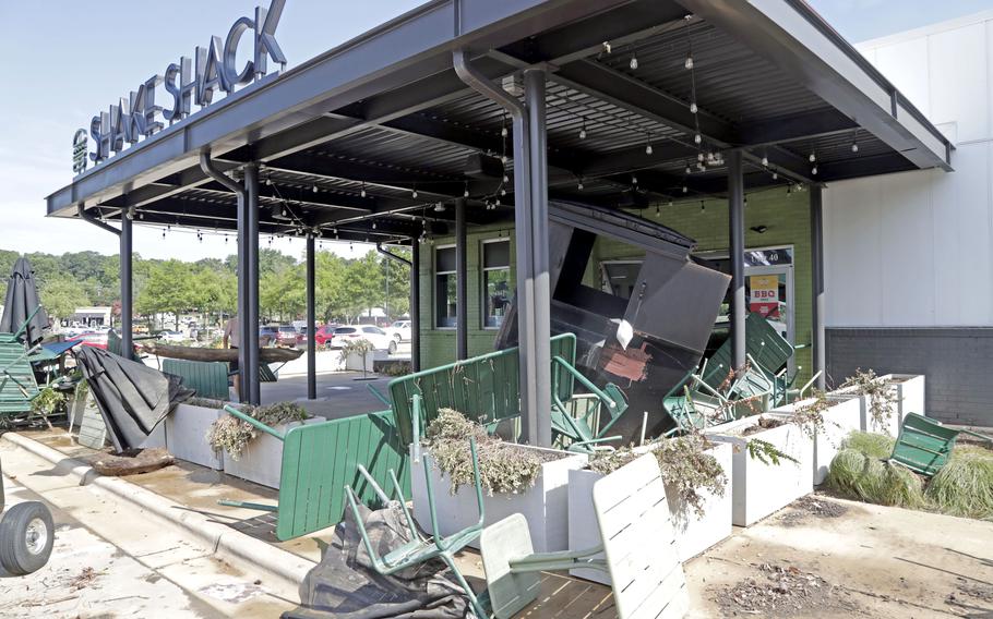 Debris litters a Shake Shake’s entrance.