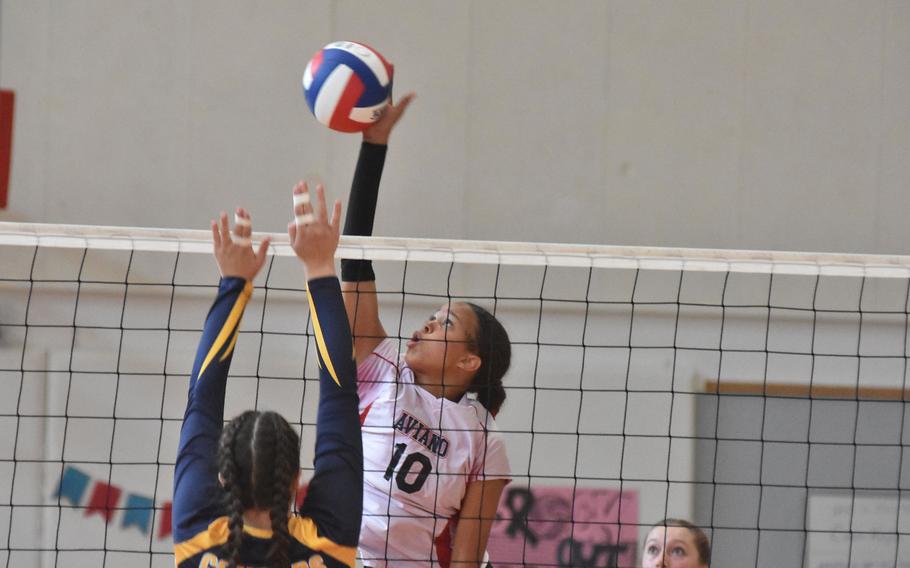Aviano's Sophia Fisher spikes the ball before the Ansbach defense can react Saturday, Oct. 15, 2022.