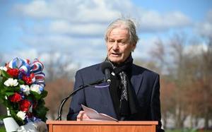 James Reston Jr. speaks at the Vietnam Veterans Memorial on March 26, 2023, in Washington, D.C. During the Vietnam War, he served in an Army intelligence unit. He was stationed in Hawaii and on weekends flew to outer islands, hunkering down in hotel rooms working on a novel.