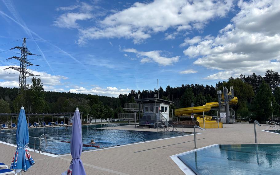A woman swims in a water park’s pool.