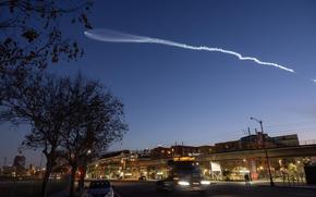 LOS ANGELES, CA- MARCH 18: A SpaceX Falcon 9 rocket launched the Starlink 7-16 mission from Vandenberg Space Force Base on Monday, March 18, 2024 as seen from Chinatown in Los Angeles, CA. (Myung J. Chun / Los Angeles Times)