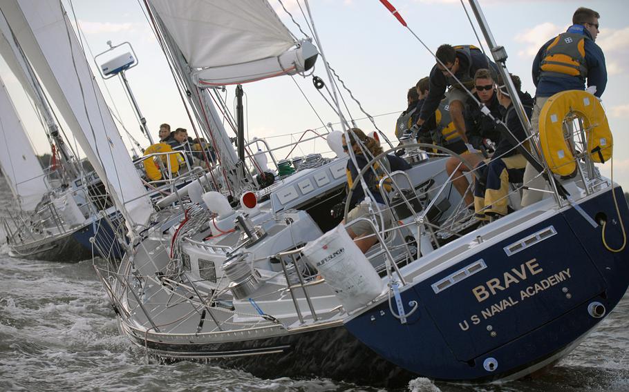 Members of the U.S. Naval Academy varsity and junior varsity offshore sailing teams practice in the Santee Basin near the academy campus for the Fall Keelboat Invitational Regatta and the McMillan Cup Intercollegiate Regatta. 