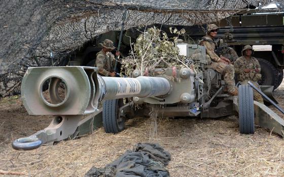 Artillerymen with the 25th Infantry Division man an M777 howitzer near the airstrip at Dillingham Airfield in Oahu, Hawaii, on Nov. 1.