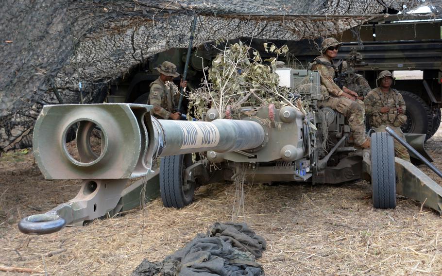 Artillerymen with the 25th Infantry Division man an M777 howitzer near the airstrip at Dillingham Airfield in Oahu, Hawaii, on Nov. 1.