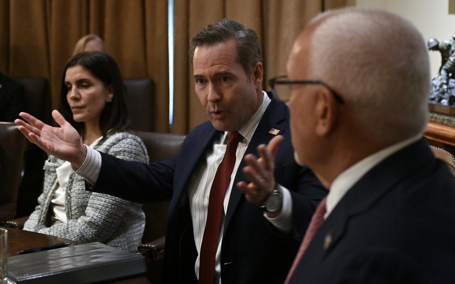 Michael Wal Walz talking to other government officials.