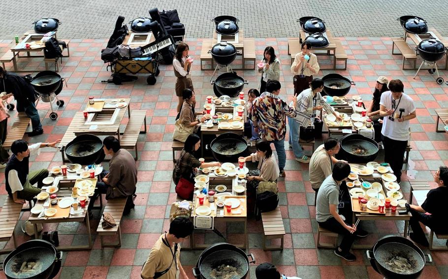 People enjoy a barbecue at Seafood & Grill YAKIYA, part of Yokohama Hakkeijima Sea Paradise near Yokohama, Japan, Oct. 1, 2023.