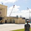 New facilities for Marines on Andersen Air Force Base, Guam, are largely complete, although work was ongoing beside one recently built hangar on Nov. 30.