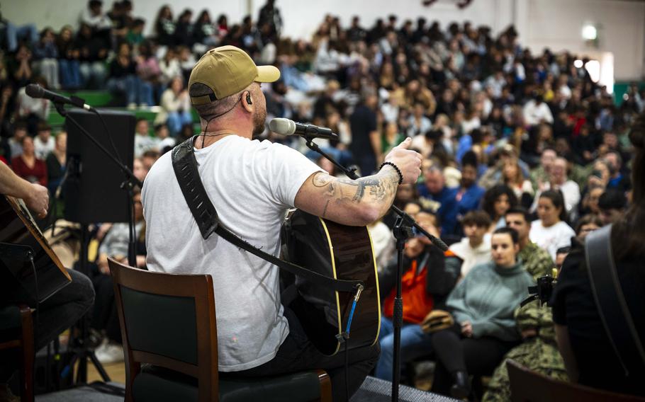 Tyler Rich, country music singer, and his band, performs