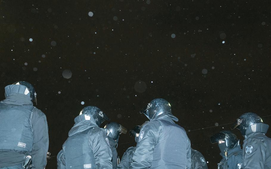 Police in St. Petersburg, Russia, during antiwar protests on Feb. 25, 2022. 