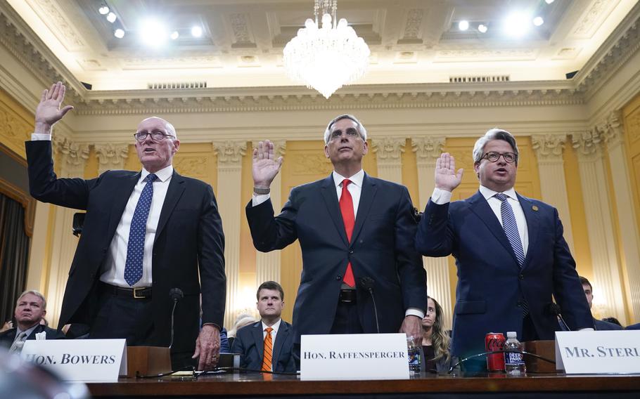 Rusty Bowers, Arizona state House Speaker, from left, Brad Raffensperger, Georgia Secretary of State, and Gabe Sterling, Georgia Deputy Secretary of State, are sworn in to testify as the House select committee investigating the Jan. 6 attack on the U.S. Capitol continues to reveal its findings of a year-long investigation, at the Capitol in Washington, Tuesday, June 21, 2022.