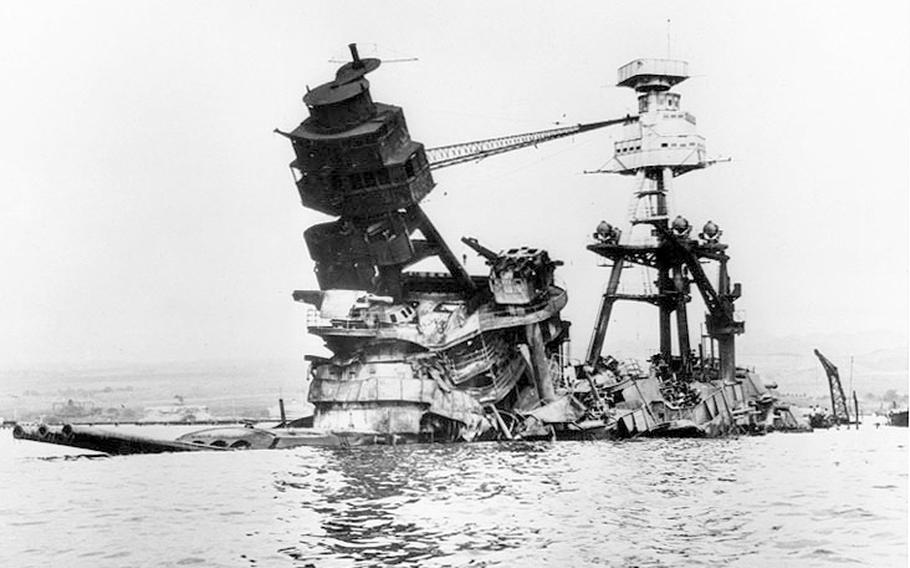The USS Arizona rests submerged in Pearl Harbor, Hawaii, shortly after the Japanese surprise attack on Dec. 7, 1941.