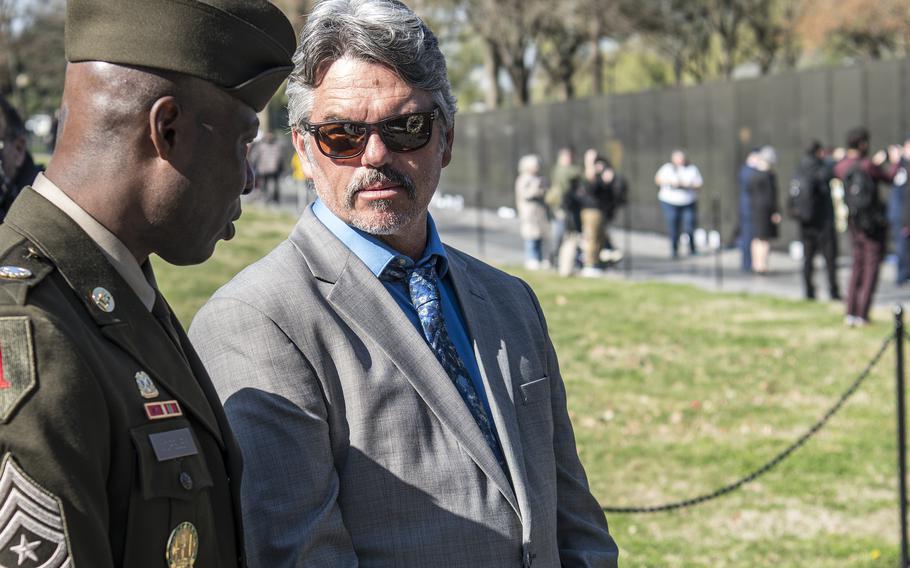 Ronnie BoisClaire and the Senior Enlisted Advisor to the Director of the Defense POW/MIA Accounting Agency Sgt. Maj. Anthony Worsley attend a silent wreath laying ceremony at the Vietnam Veterans Memorial wall in Washington, D.C., on Wednesday, March 29, 2023, to commemorate National Vietnam War Veterans Day.