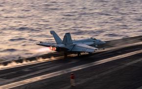 An F/A-18E Super Hornet launches from the aircraft carrier USS Harry S. Truman in the Red Sea on April 28, 2025. The Navy is investigating what caused a Super Hornet and a towing tractor to fall into the sea earlier this week.